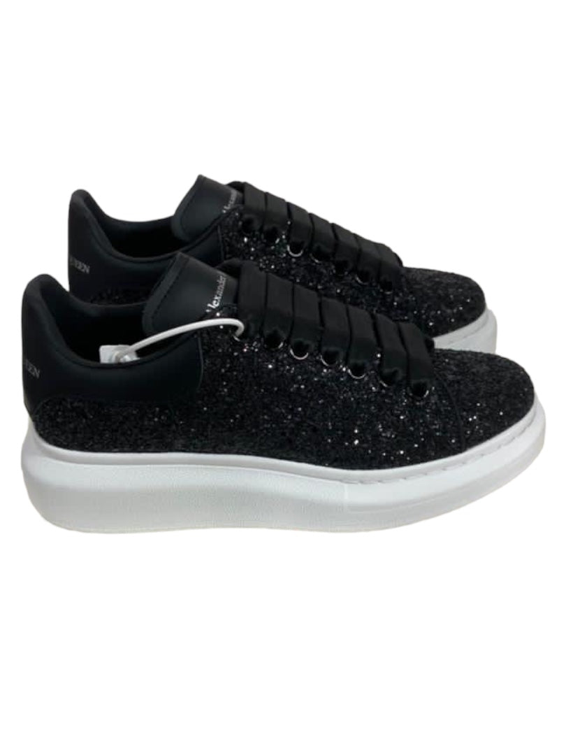 Oversize in nero glam